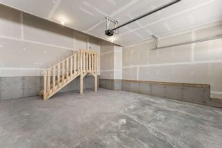 Photo 39: 59 Belgian Crescent: Cochrane Semi Detached (Half Duplex) for sale : MLS®# A2116934