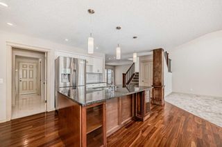 Photo 8: 1A Tusslewood Drive NW in Calgary: Tuscany Detached for sale : MLS®# A2116785