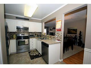 Photo 4: 303 1369 56TH Street in Tsawwassen: Cliff Drive Condo for sale in "WINDSOR WOODS" : MLS®# V1058520