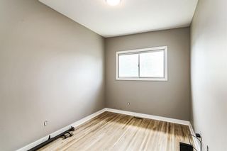 Photo 14: 515 78 Avenue NW in Calgary: Huntington Hills Semi Detached (Half Duplex) for sale : MLS®# A2007200