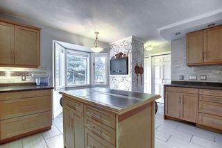 Photo 3: 207 Edgeland Road NW Calgary Home For Sale