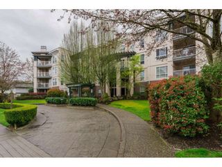 Photo 1: 308 20200 54A AVENUE in Langley: Langley City Condo for sale : MLS®# R2221595