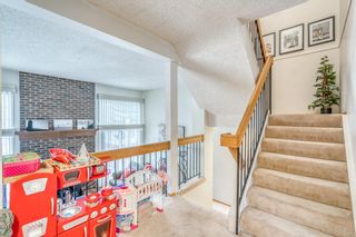 Photo 13: 350 Point Mckay Gardens NW in Calgary: Point McKay Row/Townhouse for sale : MLS®# A1233187