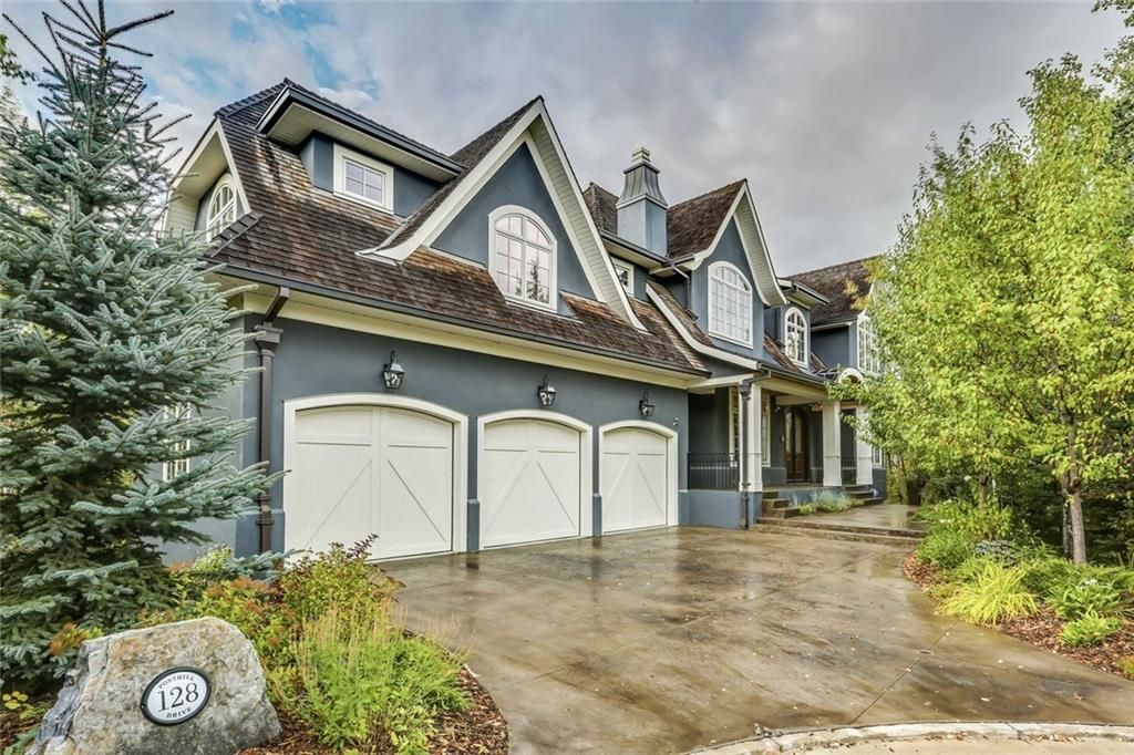Main Photo: 128 POSTHILL Drive SW in Calgary: Springbank Hill House for sale : MLS®# C418744