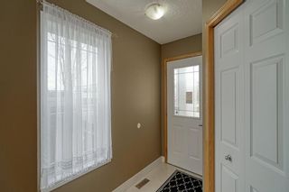 Photo 2: 7 Everridge Road SW in Calgary: Evergreen Detached for sale : MLS®# A1259117