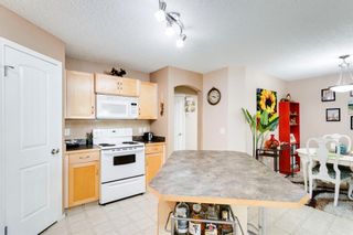 Photo 7: 103 7 Everridge Square SW in Calgary: Evergreen Row/Townhouse for sale : MLS®# A1245367