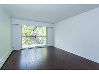 Photo 3: 305 605 COMO LAKE Avenue in Coquitlam: Coquitlam West Condo for sale in "CENTENNIAL HOUSE" : MLS®# V1122471
