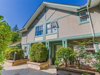 Photo 1: 44 65 FOXWOOD Drive in Port Moody: Heritage Mountain Townhouse for sale : MLS®# R2769678