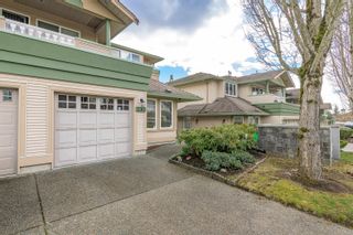 Photo 1: 230 13888 70 Avenue in Surrey: East Newton Townhouse for sale in "Chelsea Gardens" : MLS®# R2759510