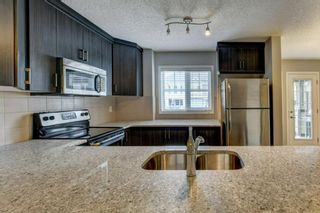 Photo 8: 143 Windford Gardens SW: Airdrie Row/Townhouse for sale : MLS®# A1214339