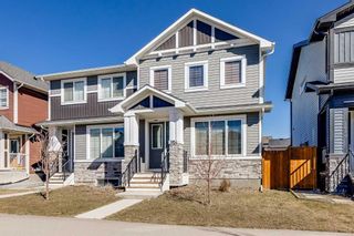 Main Photo: 1054 Carrington Boulevard NW in Calgary: Carrington Semi Detached (Half Duplex) for sale : MLS®# A2120266