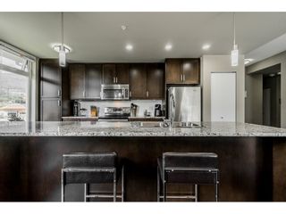 Photo 9: 410 2242 WHATCOM Road in Abbotsford: Abbotsford East Condo for sale in "~The Waterleaf~" : MLS®# R2372629