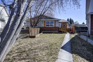 Photo 1: 187 Deerview Way SE in Calgary: Deer Ridge Semi Detached for sale : MLS®# A1096188