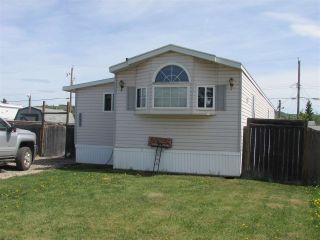 Photo 1: 10479 99 Street: Taylor Manufactured Home for sale (Fort St. John (Zone 60))  : MLS®# R2272115