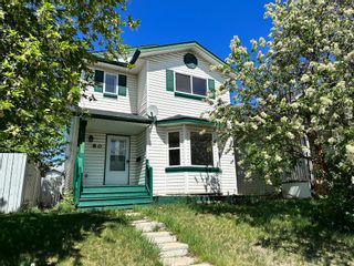 Photo 1: 80 Erin Circle SE in Calgary: Erin Woods Detached for sale : MLS®# A2050333