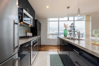 Photo 4: 504 172 VICTORY SHIP Way in North Vancouver: Lower Lonsdale Condo for sale in "ATRIUM at the PIER" : MLS®# R2754147