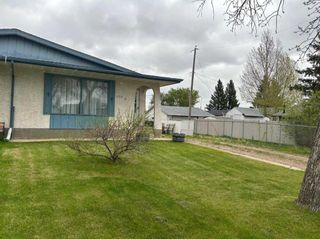 Main Photo: 5106 A 61 Avenue: Ponoka Semi Detached (Half Duplex) for sale : MLS®# A2133179