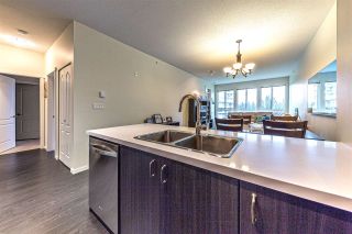 Photo 3: 404 1135 WINDSOR Mews in Coquitlam: New Horizons Condo for sale in "Bradley House at Windsor Gate" : MLS®# R2237566