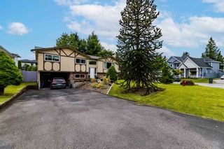 Photo 2: 12964 GLENGARRY Crescent in Surrey: Queen Mary Park Surrey House for sale : MLS®# R2715977