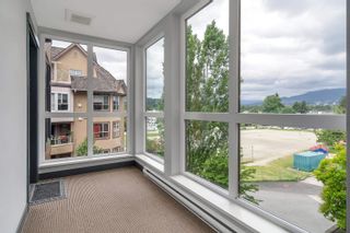 Photo 4: 307 2267 PITT RIVER Road in Port Coquitlam: Central Pt Coquitlam Condo for sale in "Prima Residence" : MLS®# R2703584