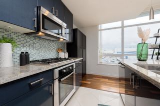 Photo 5: 504 172 VICTORY SHIP Way in North Vancouver: Lower Lonsdale Condo for sale in "ATRIUM at the PIER" : MLS®# R2754147
