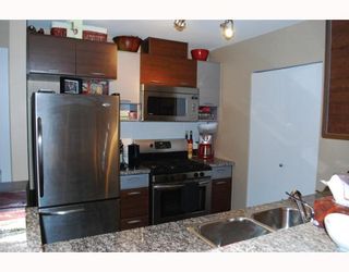 Photo 1: 317 9233 FERNDALE Road in Richmond: McLennan North Condo for sale in "RED 2" : MLS®# V804047