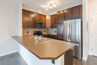 Photo 4: 303 48 Panatella Road NW in Calgary: Panorama Hills Apartment for sale : MLS®# A1231118