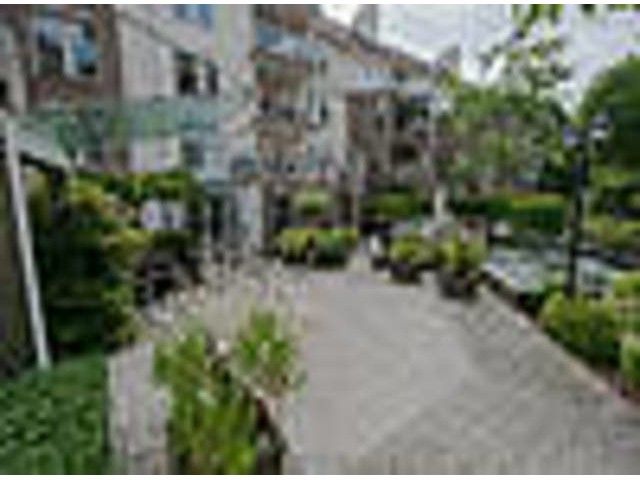 Main Photo: 210 15350 19A Avenue in Surrey: King George Corridor Condo for sale in "Strataford Gardens" (South Surrey White Rock)  : MLS®# F1318224