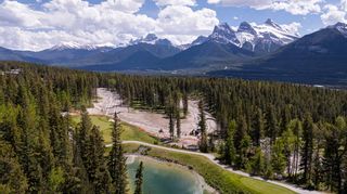 Photo 1: 446 Mountain Tranquility Place: Canmore Residential Land for sale : MLS®# A2143090
