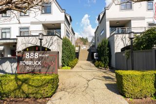 Photo 1: 12 888 W 16TH Street in North Vancouver: Mosquito Creek Townhouse for sale in "Tobruck Garden" : MLS®# R2631435