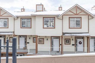 Photo 1: 12 133 Rockyledge View NW in Calgary: Rocky Ridge Row/Townhouse for sale : MLS®# A2120270