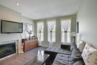 Photo 7: 314 Ascot Circle SW in Calgary: Aspen Woods Row/Townhouse for sale : MLS®# A1111264