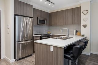 Photo 8: 110 1151 WINDSOR Mews in Coquitlam: New Horizons Condo for sale in "NEW HORIZONS" : MLS®# R2665666