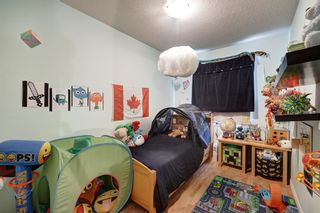 Photo 16: 2 123 Queensland Drive SE in Calgary: Queensland Row/Townhouse for sale : MLS®# A2010360