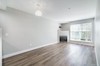 Photo 12: 215 20200 56 Avenue in Langley: Langley City Condo for sale in "THE BENTLEY" : MLS®# R2808338