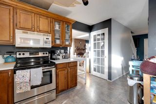 Photo 15: 24 Woodbrook Way SW in Calgary: Woodbine Detached for sale : MLS®# A2031696