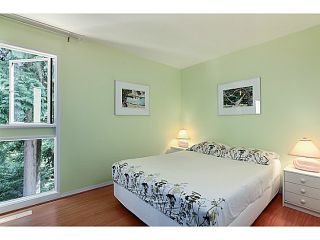 Photo 16: 1065 HERITAGE Boulevard in North Vancouver: Seymour Townhouse for sale in "HERITAGE IN THE WOODS" : MLS®# V1026380