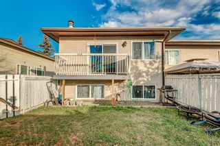 Photo 1: E 1403 44 Street SE in Calgary: Forest Lawn Row/Townhouse for sale : MLS®# A2009897