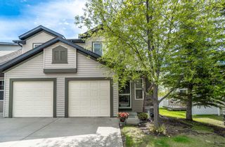Main Photo: 7 Everstone Place SW in Calgary: Evergreen Row/Townhouse for sale : MLS®# A2123925
