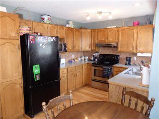 Photo 7: 596 MEADOWBROOK Bay SE: Airdrie Residential Detached Single Family for sale : MLS®# C3615313