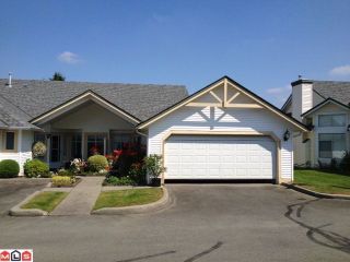 Photo 10: 110 19649 53RD Avenue in Langley: Langley City Townhouse for sale in "HUNTSFIELD GREEN" : MLS®# F1218553