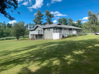 Photo 1: 12899 SUNNYSIDE Drive in Charlie Lake: Lakeshore House for sale (Fort St. John)  : MLS®# R2746651