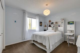 Photo 22: 124 Cougartown Close SW in Calgary: Cougar Ridge Detached for sale : MLS®# A2051695