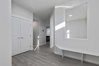 Photo 3: 90 Hotchkiss Manor SE in Calgary: C-385 Detached for sale : MLS®# A2104109