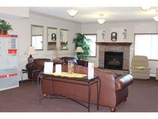 Photo 23: 304 72 Quigley Drive: Cochrane Apartment for sale : MLS®# A1196956