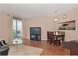 Photo 3: 309 3455 ASCOT Place in Vancouver: Collingwood VE Condo for sale in "QUEEN'S COURT" (Vancouver East)  : MLS®# V1105567