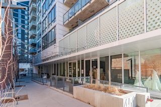 Photo 2: 305 450 8 Avenue SE in Calgary: Downtown East Village Apartment for sale : MLS®# A1187772