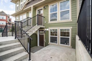 Main Photo: 309 Cranbrook Square SE in Calgary: Cranston Row/Townhouse for sale : MLS®# A2124012