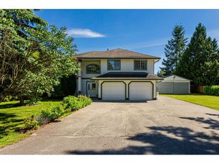Photo 1: 20080 24 Avenue in Langley: Brookswood Langley House for sale in "Brookswood" : MLS®# R2468218