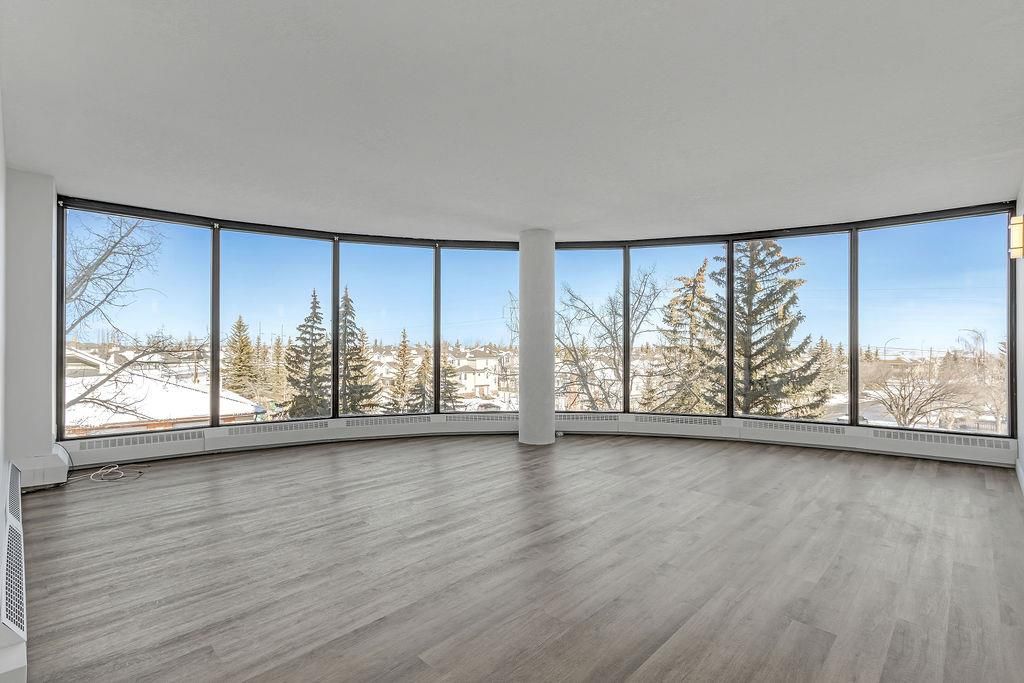 Main Photo: 353 7030 Coach Hill Road SW in Calgary: Coach Hill Apartment for sale : MLS®# A2032115